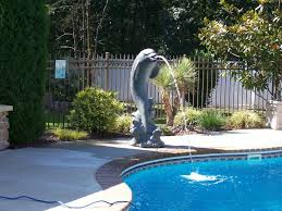 Large Dolphin Spitting Into Pool Installed By Garden Creations Swimming Pool Designs Pool Designs Swimming Pools