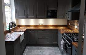 Grey kitchen cabinets wooden worktop problems with covid relief : Bella Newport Door In Opengrain Dark Grey Revelle Interiors Grey Kitchen Designs Kitchen Design Dark Grey Kitchen