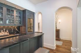 This bold and saturated gray paint color plays nice when paired with other shades of gray as in the kitchen above, but also looks great. 21 Rooms With Colorful Cabinets That Pop Luxe Interiors Design