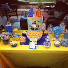 Minion Candy Table With Blue And Yellow And Touches Of Orange Banana Candies Too Of Course Minion Candy Banana Candy Candy Table