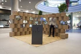 Creative Pop Up Store In Poland Made Of Cardboard And Aquariums Freshome Com Pop Up Store Pop Up Shops Pop Up