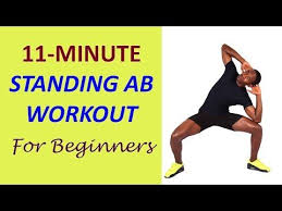 If You Want To Build Your Abdominal Muscles While Standing Do This At Home Standing Ab Workout For Beg Standing Ab Exercises Abs Workout Workout For Beginners