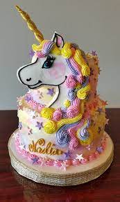 Unicorn And Stars Tiered Cake Adrienne Co Bakery Unicorn Cake Cake Tiered Cakes