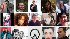 Un homme agite un drapeau français lors de la cérémonie d'hommage aux victimes des attentats. Petition Pour Que L Etat Finance Les Funerailles Des Victimes Du 13 Novembre 2015 Change Org