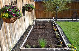 Not only do they take tiny space, but they can also be built right over your concrete patio. Vegetable Gardening In Raised Beds Containers A Pretty Life In The Suburbs