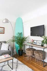 How One Couple Made Their 700 Square Foot Apartment Feel So Much Bigger The Everygirl First Apartment Decorating Small Living Room Decor Studio Apartment Decorating