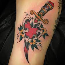 For some, it depicts loss, hurt and suffering due to heartbreak. Traditional Heart And Dagger Tattoo