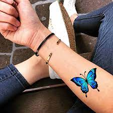 Because butterfly tattoos are highly versatile, they can be placed on pretty much any part of the body. Amazon Com Blue Morpho Butterfly Temporary Fake Tattoo Sticker Set Of 2 Www Ohmytat Com Beauty Personal Care