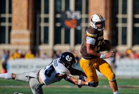 Wyoming Cowboys Football Quarterback Decision In The Air