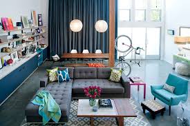 Stylish home office with an eclectic interior featuring a black background. 50 Eclectic Living Rooms For A Delightfully Creative Home
