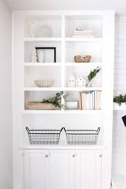 This functional white wall shelf compliments any room and shows no visible support, making it appear to be floating.read more. A Minimalist S Guide To Holiday Shelf Decor Halfway Wholeistic