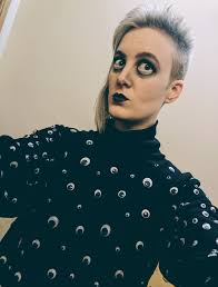 Halloween costume made of cardboard and noodles