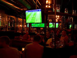 Cozy bar with great bartenders. Pokalen Sportspub Vulkan Oslo