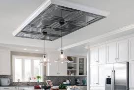 This sleek farmhouse kitchen integrates the hardware, storage cabinets, and the appliances into the walls. Kitchen Ceiling Ideas Ceilings Armstrong Residential
