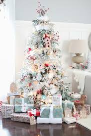 Flocked Christmas Tree Blue And Red Christmas Theme Christmas Tree Decorating White Christmas Tree Decorations Christmas Tree Inspiration Red Christmas Tree