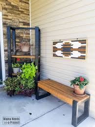 This bench also includes a storage area underneath the seat for storing outdoor items such as sporting equipment or garden tools. Diy Outdoor Plant Shelf Woodworking Plans Mama Needs A Project