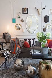 'i totally transformed this room on a budget, and i couldn't be happier with the outcome,' she tells us. 9 Ideas For Decorating The Living Room Walls On A Budget