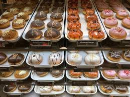 Dip the doughnuts into creamy glaze set on rack then when slightly cooled spread chocolate frosting on top. Best Donoughts Review Of Krispy Kreme Doughnuts Birmingham England Tripadvisor