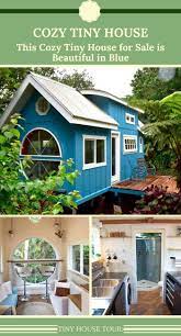 this cozy tiny house for sale is beautiful in blue tiny house tiny houses for sale tiny house trailer