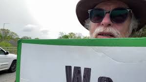 Man With Sign, May 10, 02024