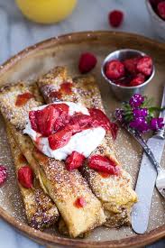 Lemon Ricotta Cheese Stuffed French Toast Crepes With Vanilla Stewed Strawberries Half Baked Harvest Recipe Food Recipes Yummy Breakfast