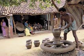 Photograph A Man Makes Pottery On A Wheel In The Village Of Gunupur Odisha State India Indian Village Rural India Pottery