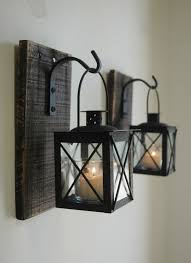 Lantern Pair With Wrought Iron Hooks On Recycled Wood Board For Unique Wall Decor Home Decor B Decoration Murale Unique Lanternes En Metal Idee De Decoration