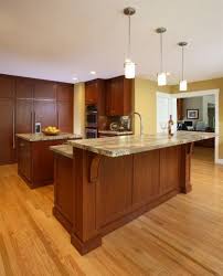 The main difference is in the presence of a second countertop, which makes it more of a dividing rather than transitioning feature. 33 Kitchen 2 Tier Islands Ideas Kitchen Remodel Kitchen Design New Kitchen