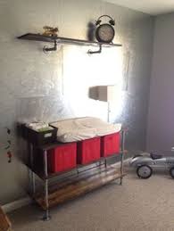 Industrial Nursery With A Metal Wall And Industrial Changing Table Baby Changing Table Nursery Changing Table Industrial Nursery