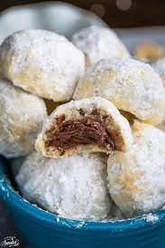 Nutella Stuffed Snowball Cookies With Nutella Unsalted Butter Powdered Sugar Vanilla All Pur Cookie Exchange Recipes Snowball Cookie Recipe Nutella Recipes