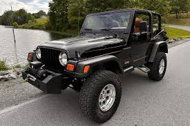 Image result for Brilliant Black 2002 Jeep