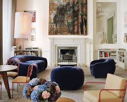 In a hamptons home, the family room's sofa and club chairs are by celerie kemble for henredon; Top 5 Paris Interior Design Projects Savvy Wood Tailors Club
