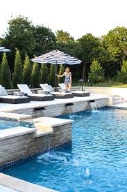 The smooth wooden slats create a although this isn't one of the easiest diy pool patio ideas, it's definitely customizable in what color scheme and textured tile you decide to go with. Outdoor Patio Decorating Ideas The Pool Reveal Curls And Cashmere