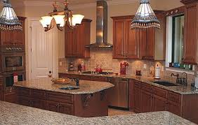 Traditional Italian Kitchen Design Wood Cabinets In Combination With Stone Counters Stone Backs Italian Style Kitchens Tuscan Kitchen Italian Kitchen Design