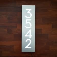 Illuminated lettered house number plaque illuminated house. Glowsigns Bespoke Led House Number Sign Vertical 4 Etsy Led House Numbers Led House House Number Sign