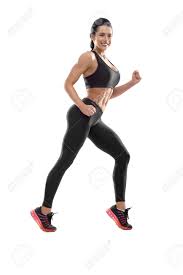 Photo Of Posing Athletic Female. Smiling Woman With Fit, Curvy Body Doing  Sport Exercises. Model Having Slim, Stunning Figure, Wearing Sport Trousers  And Top, Also Sneackers For Professional Run. Stock Photo, Picture