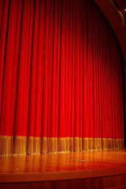 reminds me of the stage in the cafeteria at school theatre curtains curtains the magicians