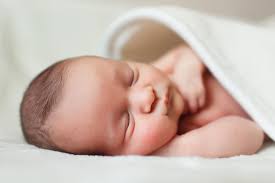 How To Put Baby Into A Crib Without Waking Her Up