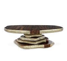 It is fairly low and so not suitable for sitting around and drinking coffee while sitting on chairs. Artistic Center Tables To Inspire You Center Tables