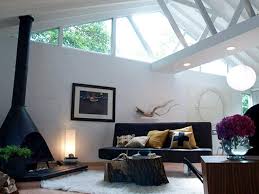 This modern marvel is an architectural dream. Vaulted Ceilings A Modern Twist On Classic Architecture Modern White Living Room Living Room Designs Living Room With Fireplace