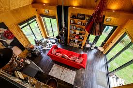 Everything you need to live for a year or more. Living Big In A Tiny House Stunning Black Off Grid Cabin By The River