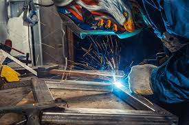 Ad A Young Man Welder By Sova On Creativemarket A Young Man Welder In A Blue Construction Overall In A Welding Mask And C Welders 3d Illustration Young Man