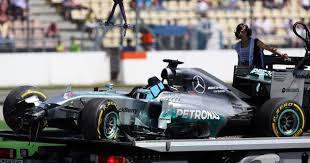 The Mercedes Amg F1 W05 Of Lewis Hamilton Mercedes Amg F1 Is Recovered Back To The Pits On The Back Of A Truck After He Crashed Out Of The First Sessi Formule 1