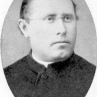 Australian Army Padre Capt. Damien Ellis says a prayer