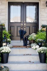 Front Porch With Black And White Decor Using White Mums And Neutral Pumpkins Front Door Paint Colors Fall Porch Painted Front Doors