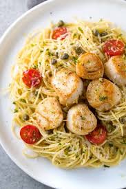 Ingredients · 12 ounces uncooked penne rigate or farfalle pasta · 1/4 cup fresh lemon juice · 1/4 cup olive oil · 1 tbsp capers · 1 tbsp caper liquid · 1 clove garlic . Pan Seared Scallops With Lemon Caper Pasta Jessica Gavin
