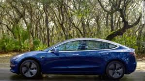 Model 3 owner gets their black tesla model 3 perfected with a satin perfect blue wrap. Tesla Temporarily Halts Production Of Its Model S And Model X Cnn