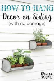 How To Hang Decor On Siding Hanging Patio Lights Small Patio Outdoor Wall Decor