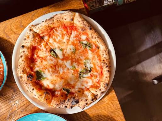 Xacuti Pizza