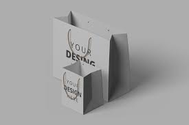 A free paper shopping bag mockup to display your branding and packaging designs in a photorealistic way. Free Shopping Bag Mockup Free Design Resources